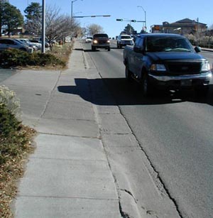 No buffer between street and sidewalk